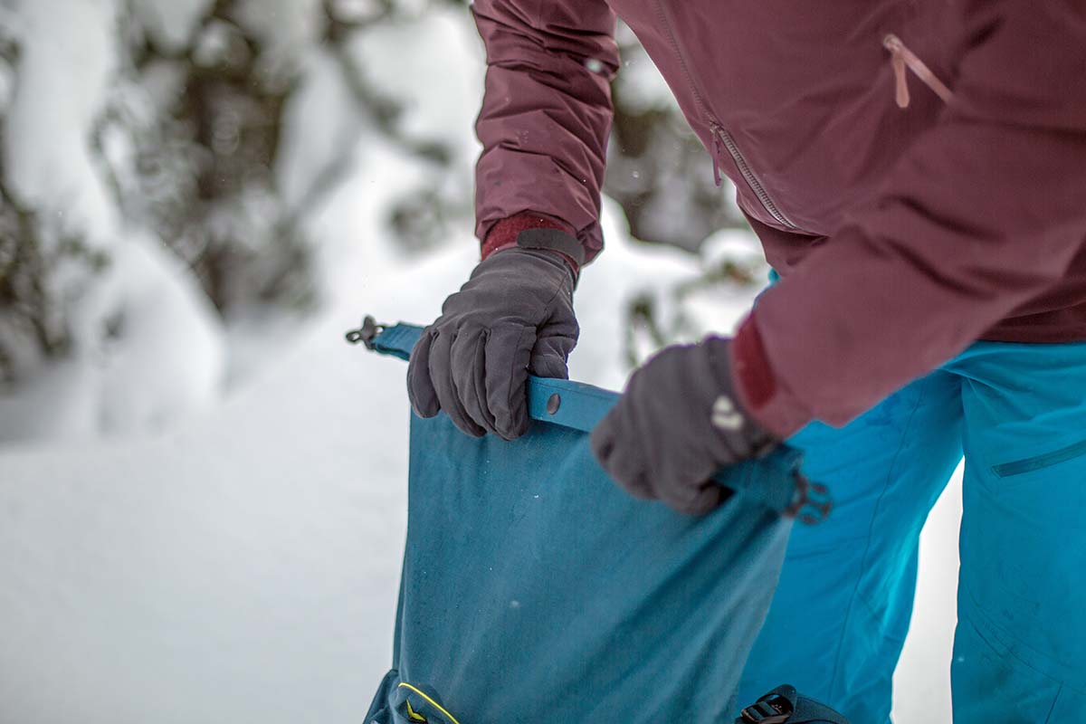 Rolling up the roll-top on Patagonia Descensionist ski pack